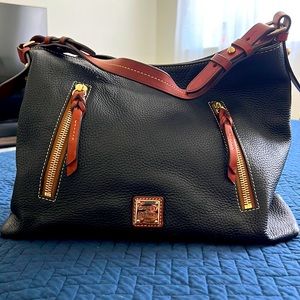 Vintage Dooney & Bourke black leather pebble bag. Well used loved!